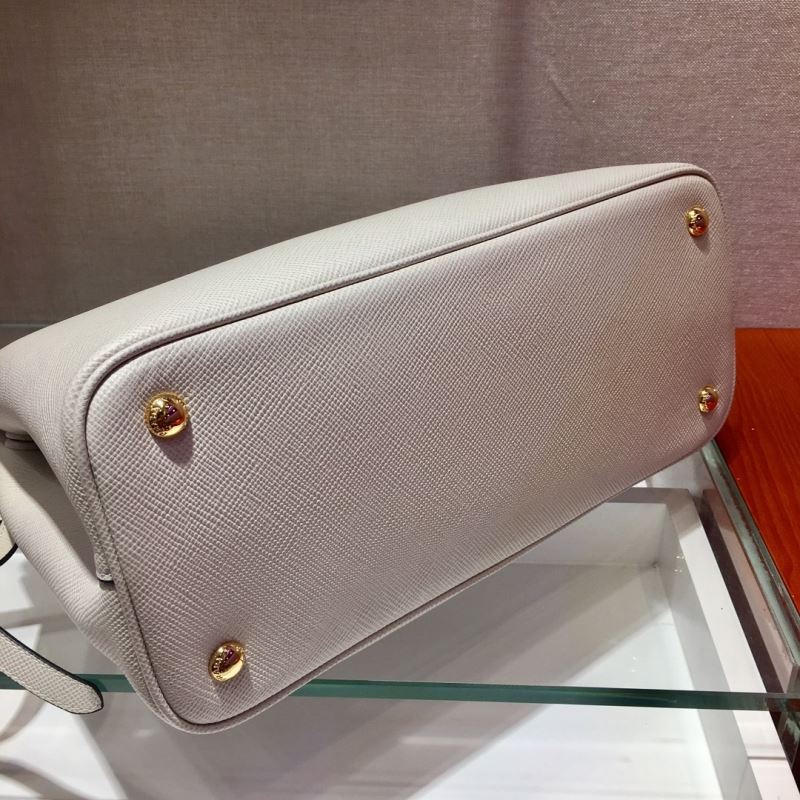 Pra*a top handle bags